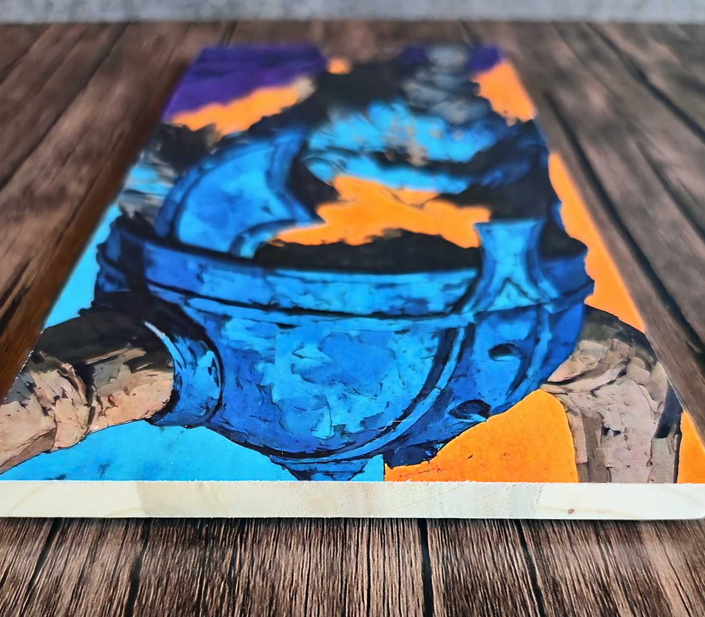 Colorful abstract painting on a wooden surface