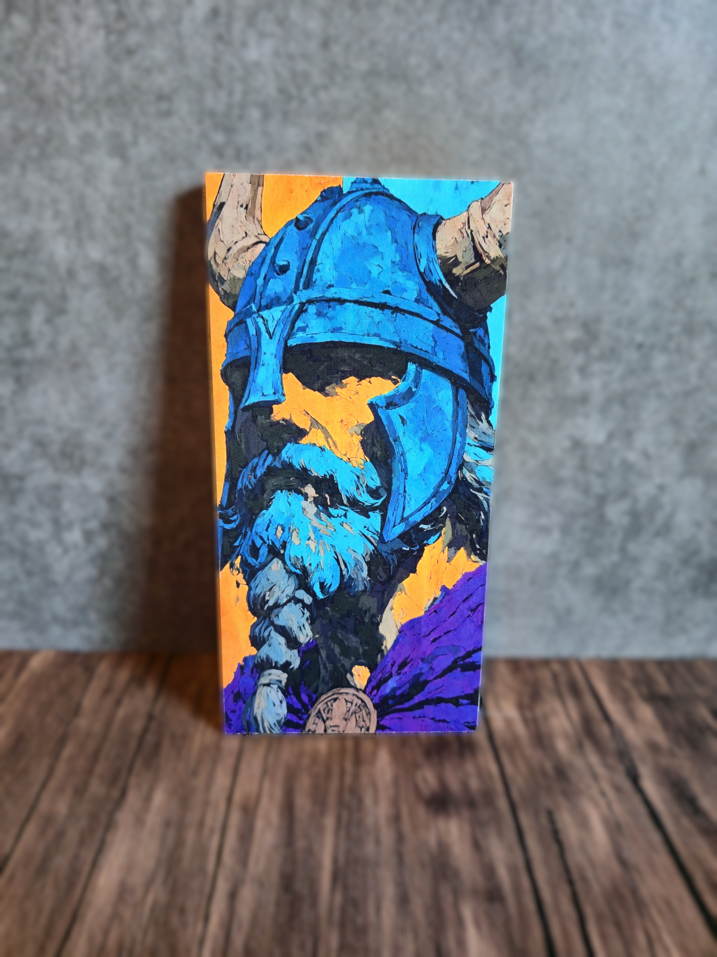 Decorative box with a blue helmet design on a gray surface