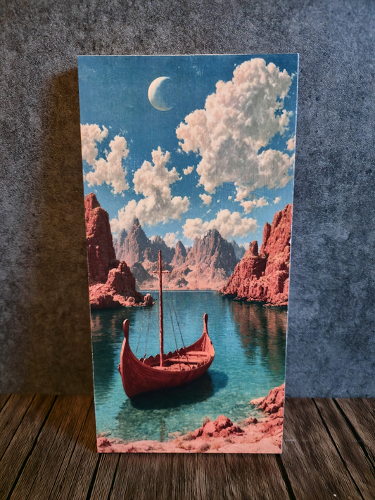 Viking ship in cove with mountain landscape.
