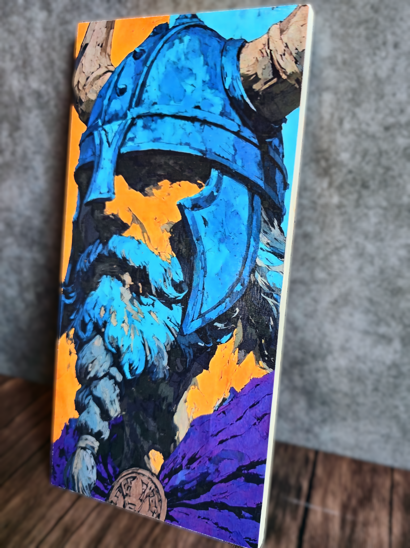 Colorful illustration of a warrior on a rectangular object with a textured background