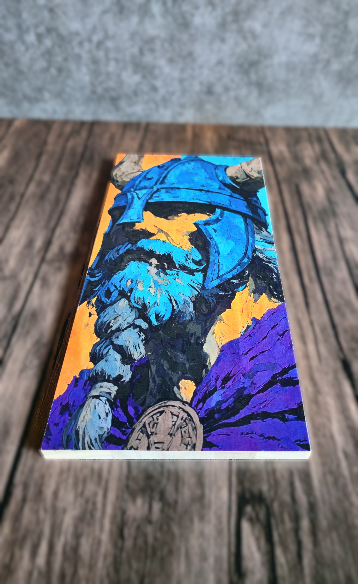 artwork with a colorful design on a wooden surface