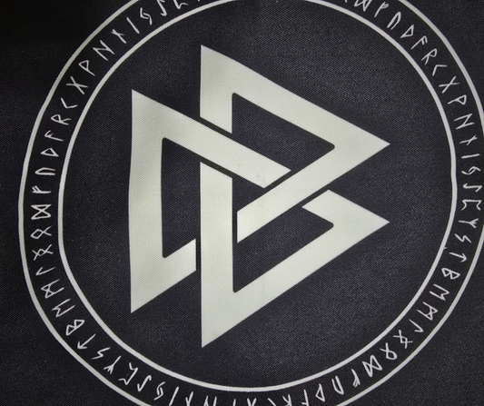 Black rune mat featuring a white Valknut interlocking triangles symbol, encircled by a ring of Elder Futhark runes and Celtic knotwork trim—ideal for Norse divination and rune readings.